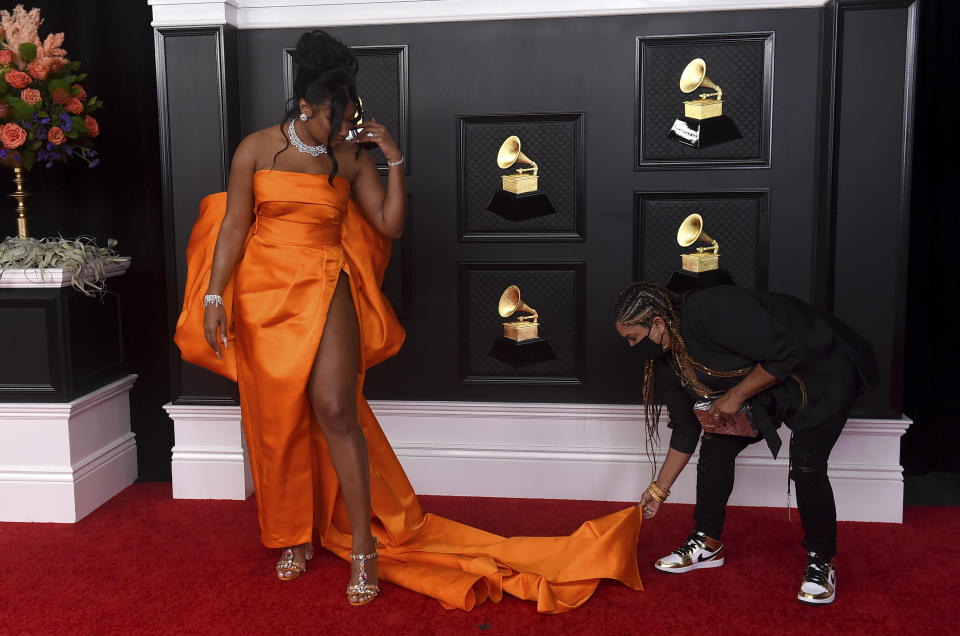 Megan Thee Stallion arrives at the 63rd annual Grammy Awards at the Los Angeles Convention Center on Sunday, March 14, 2021. (Photo by Jordan Strauss/Invision/AP)