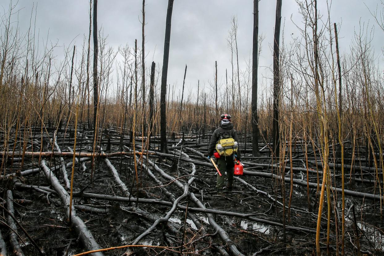 Alberta wildfire fighters at work fighting wildfires in Alberta, Canada during the heavy wildfire season in the summer of 2023.