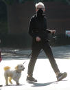 <p>Jamie Lee Curtis wears all black while on her walk with her dog on Tuesday in L.A.</p>