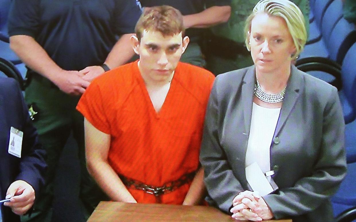 Nikolas Cruz is seen on a closed circuit television screen during a bond hearing on February 15 - Getty Images