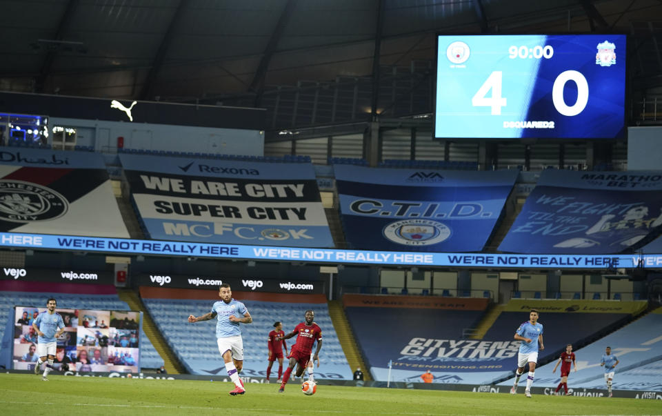 Scoreboard shows the final score during the English Premier League soccer match between Manchester City and Liverpool at Etihad Stadium in Manchester, England, Thursday, July 2, 2020. (AP Photo/Dave Thompson,Pool)