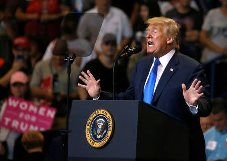 U.S. President Donald Trump speaks during campaign rally at Mohegan Sun Arena in Wilkes-Barre, Pennsylvania, U.S., August 2, 2018. REUTERS/Leah Millis