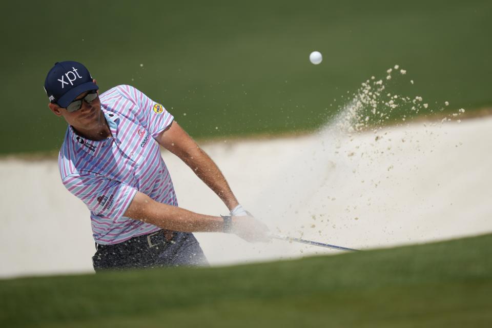 Adam Schenk hits from the bunker on the second hole during final round at the Masters golf tournament at Augusta National Golf Club Sunday, April 14, 2024, in Augusta, Ga. (AP Photo/Matt Slocum)