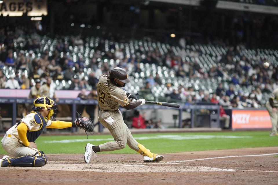San Diego Padres' Luis Campusano hits an RBI single during the seventh inning of a baseball game against the Milwaukee Brewers Tuesday, April 16, 2024, in Milwaukee. (AP Photo/Morry Gash)