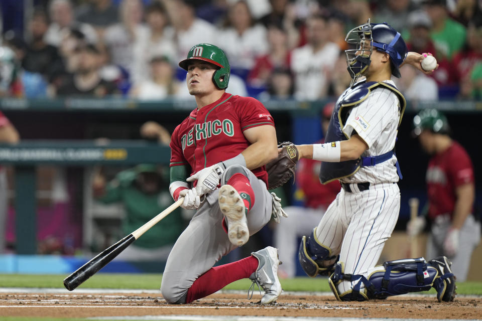 Mexico's Luis Urias reacts after a strike during the second inning of a World Baseball Classic game against Japan, Monday, March 20, 2023, in Miami. (AP Photo/Wilfredo Lee)