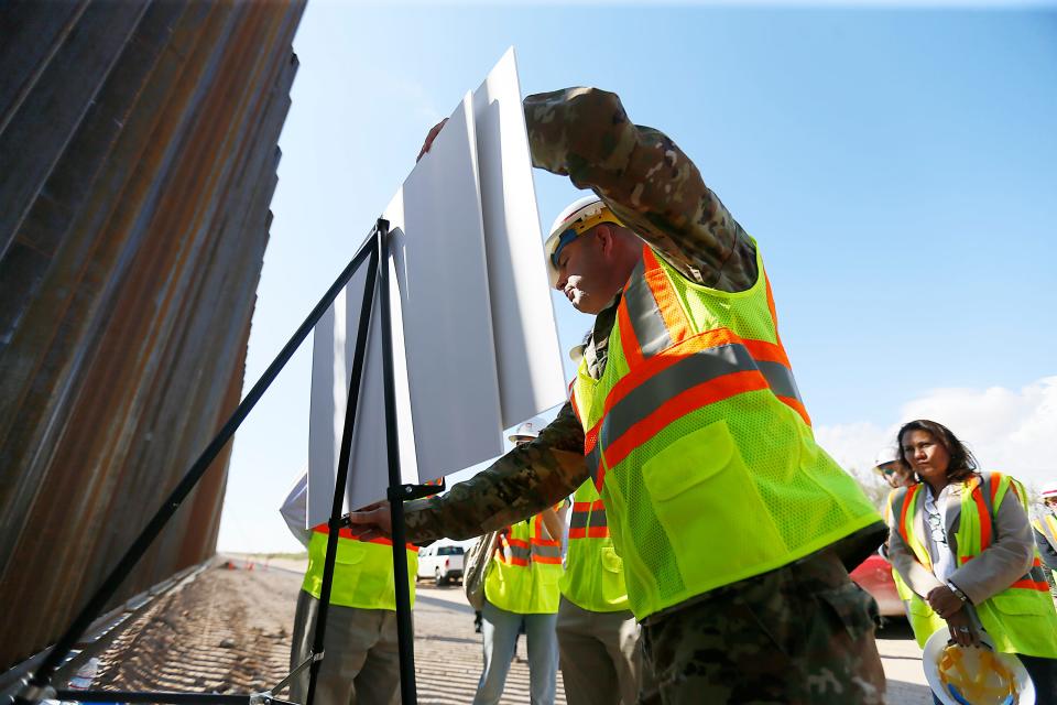 Representative Adam Smith, chairman of the House Armed Services Committee, and Representative Veronica Escobar, tour the construction site of a new border fence being built in rural Southern New Mexico between Santa Teresa and Columbus, N.M., South of Highway 9 Tuesday, Oct. 8, in N.M.