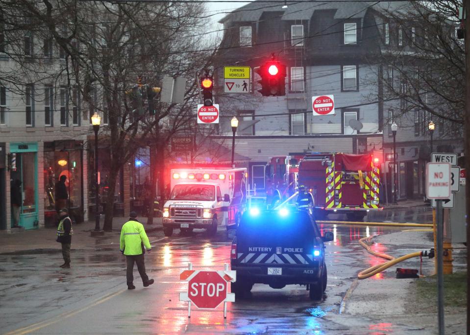 Wallingford Square in Kittery was blocked to vehicle traffic early Friday morning as firefighters responded to multiple car fires near a garage April 12, 2024.