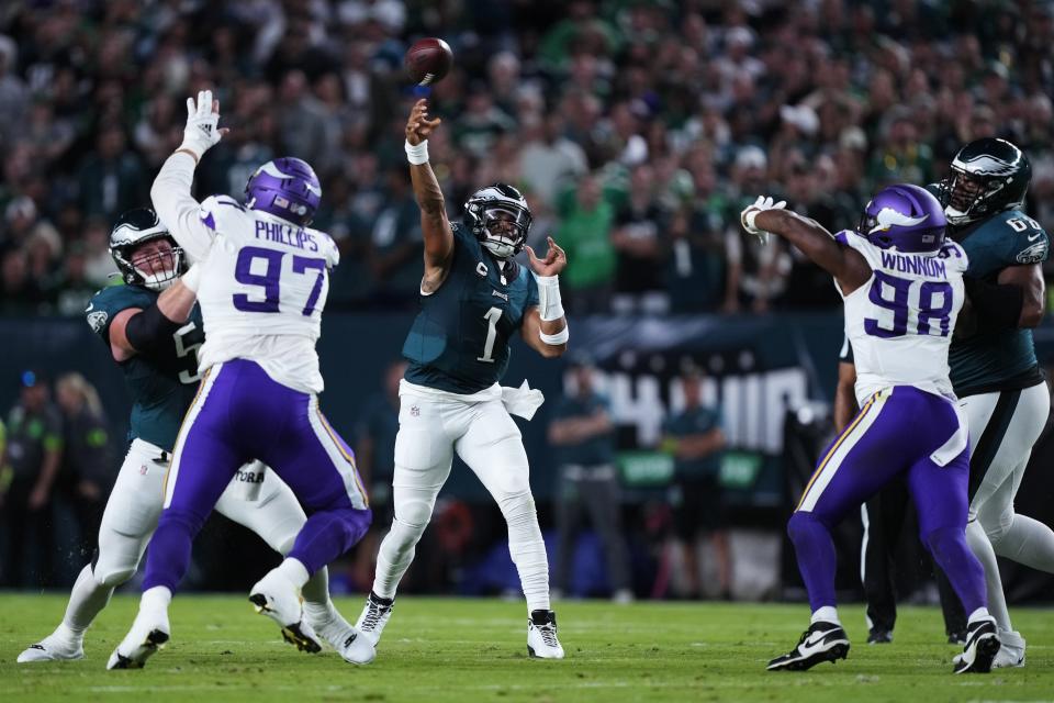 Philadelphia Eagles quarterback Jalen Hurts (1) throws during the first half of an NFL football game against the Minnesota Vikings on Thursday, Sept. 14, 2023, in Philadelphia. (AP Photo/Matt Rourke)