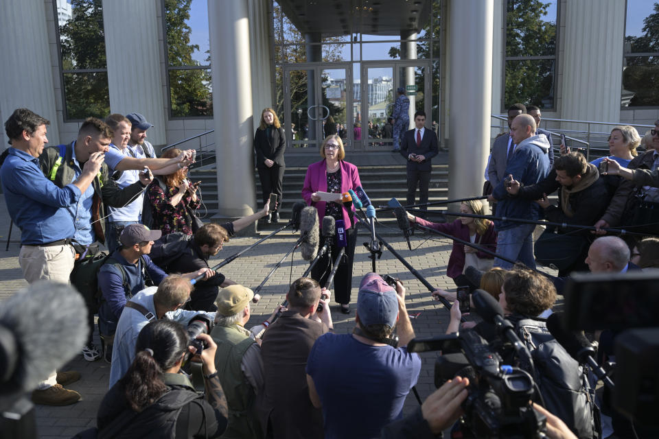 U.S. Ambassador to Russia Lynne Tracy, center, speaks to the media after hearing on Wall Street Journal reporter Evan Gershkovich's case at the Moscow City Court, in Moscow, Russia, on Tuesday, Sept. 19, 2023. A Russian court on Tuesday is scheduled to hear a defense appeal of Wall Street Journal reporter Evan Gershkovich against the decision to extend his period of detention. (AP Photo/Dmitry Serebryakov)