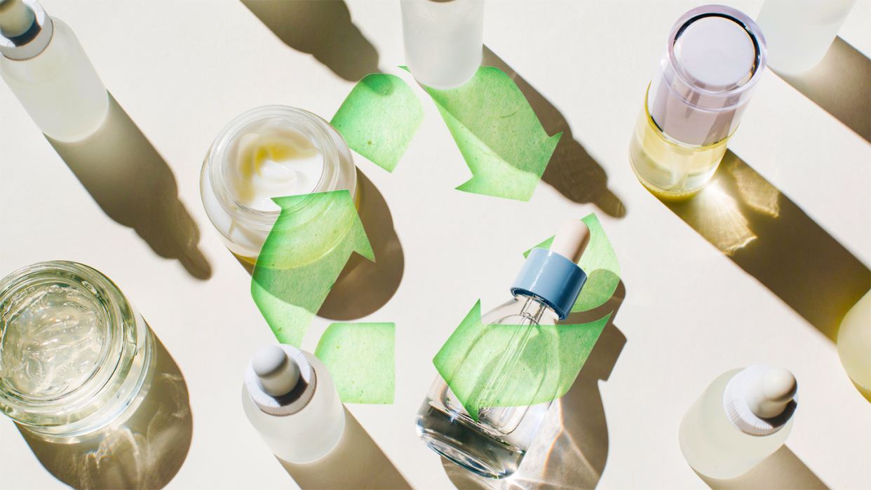 beauty and skincare bottles with a recycling symbol on top