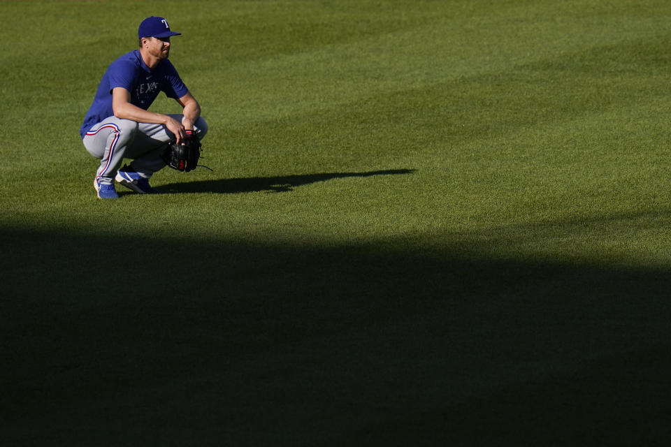 Texas Rangers pitcher Jacob deGrom works out prior to a baseball game against the Baltimore Orioles, Friday, May 26, 2023, in Baltimore. (AP Photo/Julio Cortez)