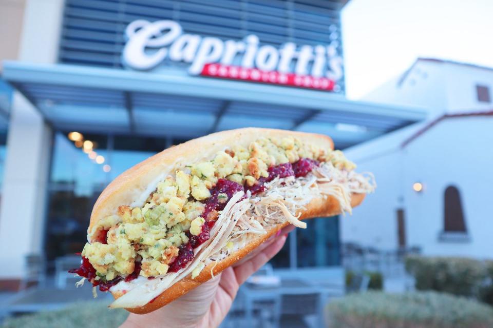 <p><strong>Thanksgiving Sub </strong><br><br>The easiest way to describe this sandwich is taking all of the fixings of Thanksgiving dinner and putting it into a sub. Invented by Delaware’s <a href="https://www.capriottis.com/" rel="nofollow noopener" target="_blank" data-ylk="slk:Capriotti’s Sandwich Shop;elm:context_link;itc:0;sec:content-canvas" class="link ">Capriotti’s Sandwich Shop</a> more than 40 years ago, it’s made with house-roasted turkey, stuffing, cranberry sauce and mayo. It’s a personal favorite by Joe Biden.</p>