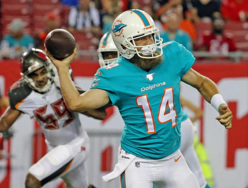 Miami Dolphins quarterback Ryan Fitzpatrick (14) as they play the Tampa Bay Bucs at Raymond James Stadium in Tampa, Florida, Friday, August, 16, 2019.
