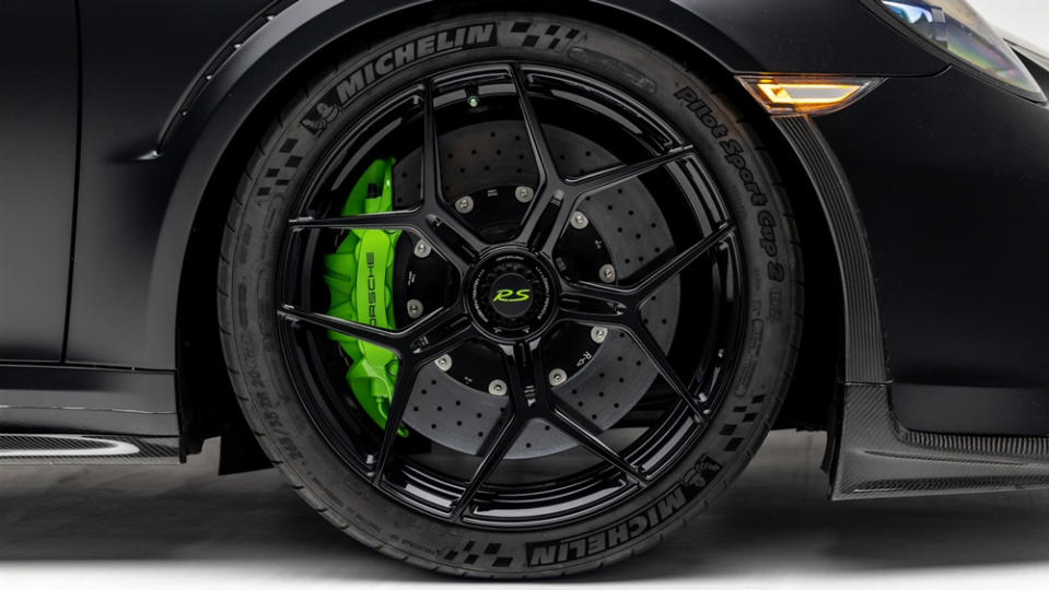 The car’s center-lock aluminum wheels showcase an intricate web design envisioned by the owner and GMG. - Credit: Photo by Ted Seven, courtesy of Global Motorsports Group.