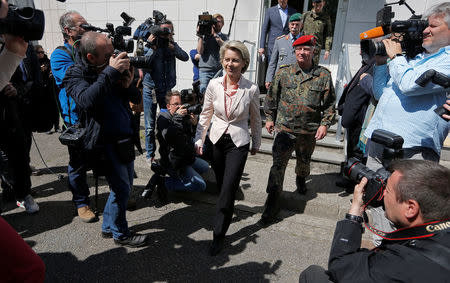 German Defence Minister Ursula von der Leyen is surrounded by journalists, as she visits the 291st fighter squadron based at the "Quartier Leclerc", a military facility for French and German military units in Illkirch-Graffenstaden near Strasbourg, France May 3, 2017. REUTERS/Vincent Kessler