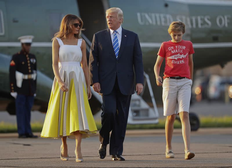 Barron Trump, with parents Melania and Donald Trump, was seen wearing a J.Crew t-shirt. (Photo: Getty Images)