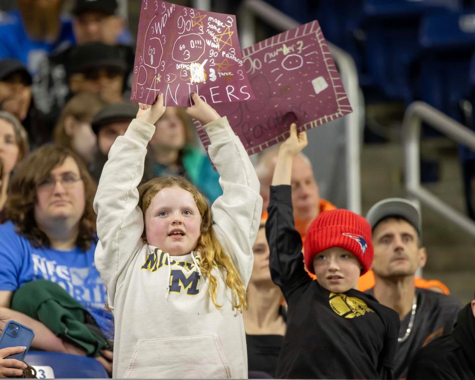 Some Michigan Panthers fans have fun during the first half of the UFL game against the St. Louis Battlehawks at Ford Field, March 30, 2024.