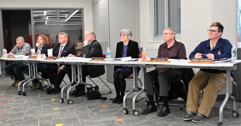 Coldwater Community Schools board listened intently to the two superintendent finalist Thursday night in the Lakeland Elementary media center.