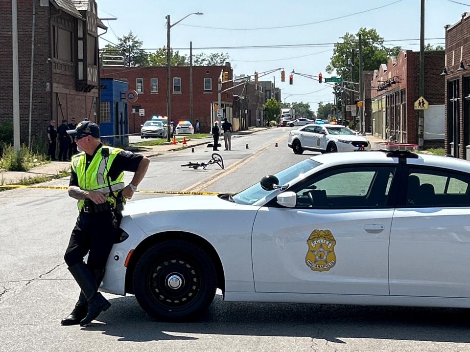 An Indianapolis Metropolitan Police Department vehicle and bicyclist crashed on East Washington Street near its intersection with Tuxedo Street.