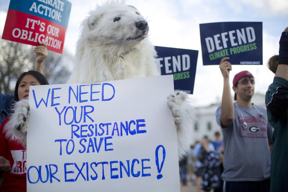 A demonstrator dressed as a polar bear in front of the White House, March 28, 2017, during a rally against President Trump’s Energy Independence Executive Order. (Photo: Pablo Martinez Monsivais/AP)