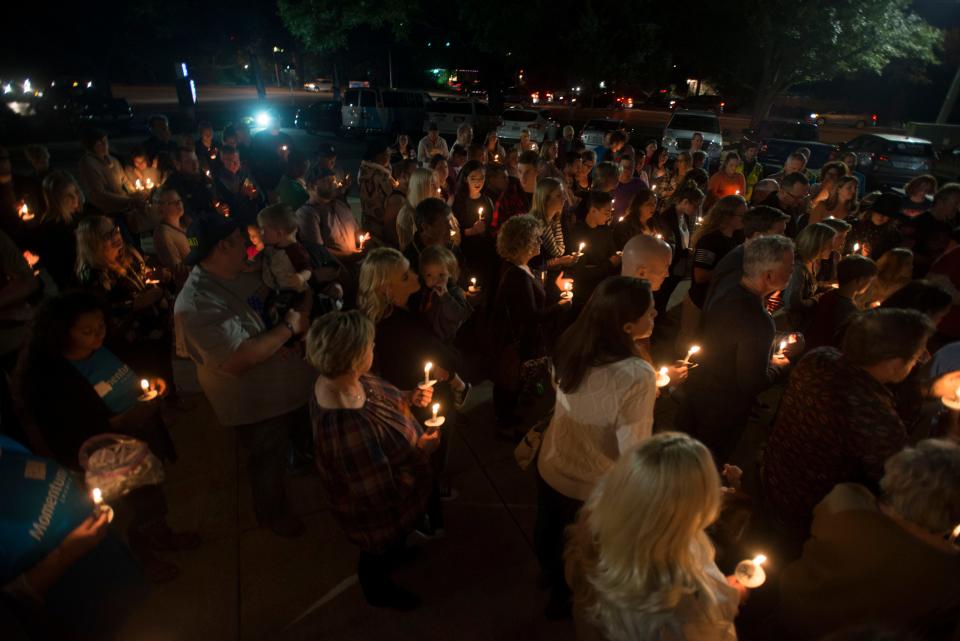 Momentum Church held a candlelight vigil for victims of the NAS Pensacola shooting Saturday, December 7, 2019.