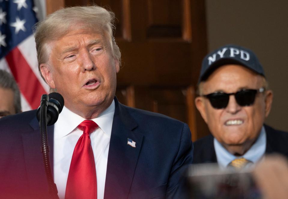 President Trump and Rudy Giuliani on Aug. 14, 2020, in Bedminster, New Jersey.
