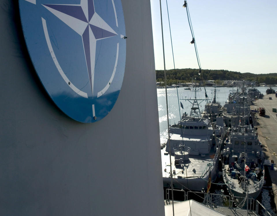 FILE- NATO naval mine countermeasure vessels berth in Turku, Finland, during the international Northern Coasts 2014 (NOCO14) military exercise on Aug. 29, 2014. Finland appears on the cusp of joining NATO. Sweden could follow suit. By year's end, they could stand among the alliance's ranks. Russia's war in Ukraine has provoked a public about face on membership in the two Nordic countries. They are already NATO's closest partners, but should Russia respond to their membership moves they might soon need the organization's military support. (Roni Lehti/Lehtikuva via AP)