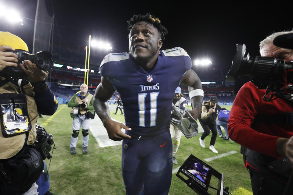 Tennessee Titans wide receiver A.J. Brown (11) leaves the field after a 20-17 win over the San Francisco 49ers in an NFL football game Thursday, Dec. 23, 2021, in Nashville, Tenn. (AP Photo/Wade Payne)