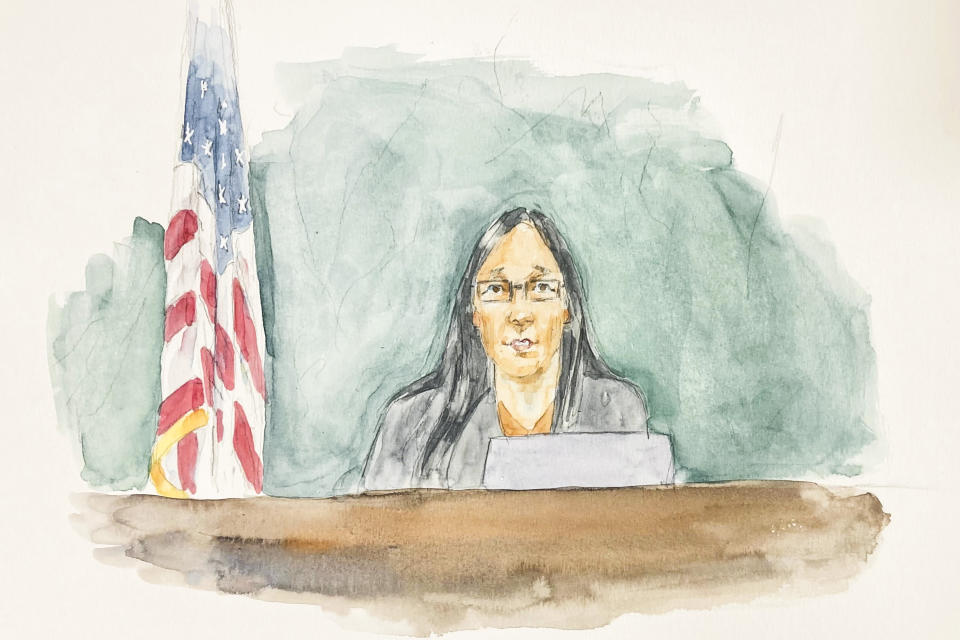 This courtroom sketch shows Brooklyn Federal Court Judge Pamela K. Chen reading a note from the jury, during deliberations in the trial of two former Fox executives accused of paying bribes to gain broadcasting rights to FIFA soccer matches, including the World Cup, Wednesday March 8, 2023, in New York. (Aggie Whelan Kenny via AP)