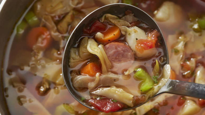 cabbage and kielbasa soup ladle