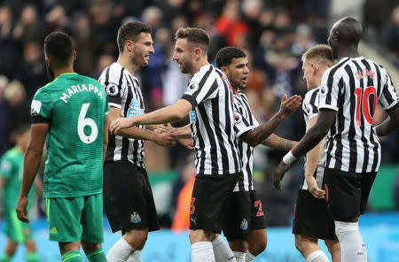 Soccer Football - Premier League - Newcastle United v Watford - St James' Park, Newcastle, Britain - November 3, 2018 Newcastle United's Fabian Schar and Paul Dummett celebrate after the match REUTERS/Scott Heppell