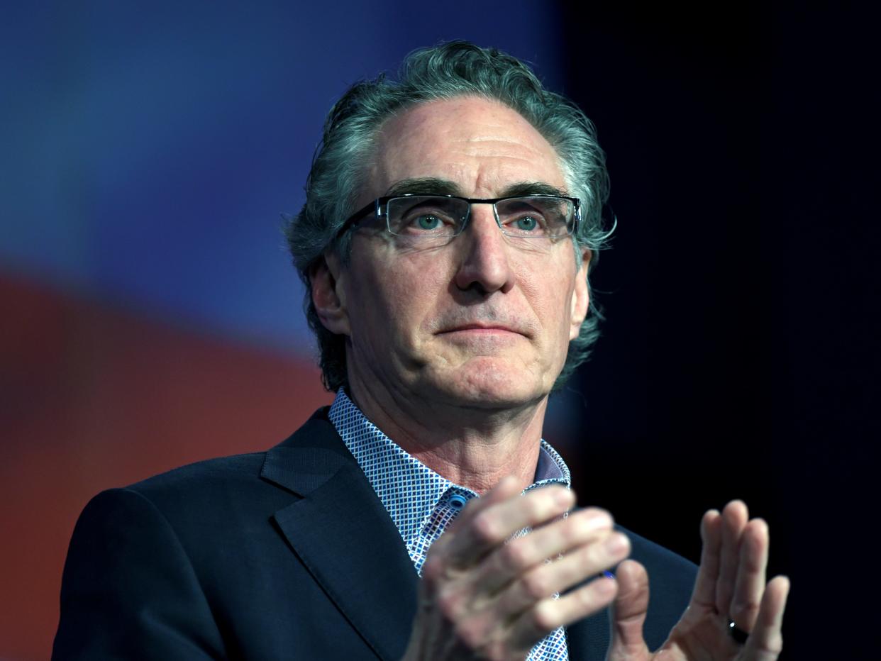 FILE PHOTO: Governor Doug Burgum (R-ND) speaks to delegates at the Republican State Convention in Grand Forks, North Dakota, U.S. April 7, 2018. Picture taken April 7, 2018. REUTERS/Dan Koeck