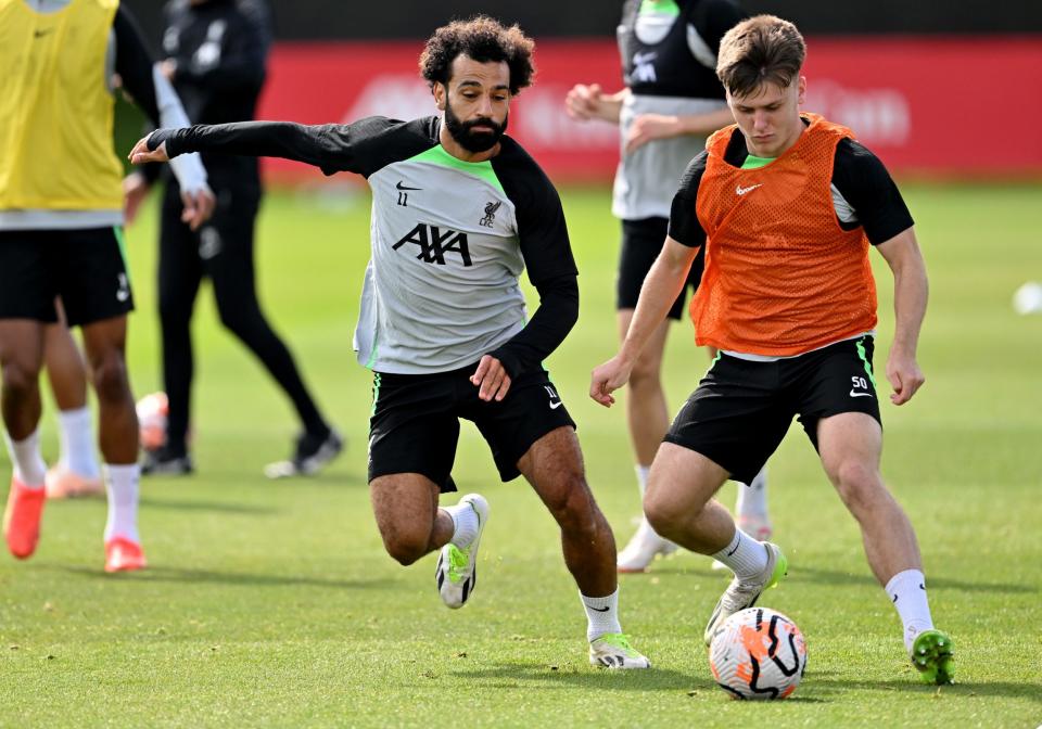Mohamed Salah and Ben Doak of Liverpool during a training session at AXA Training Centre on August 30, 2023 in Kirkby, England