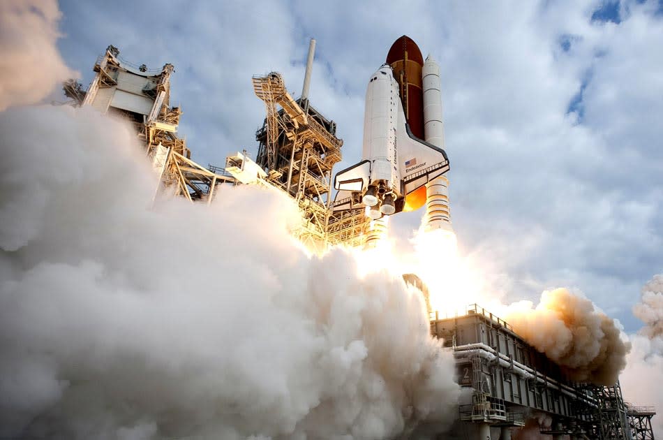 CAPE CANAVERAL, FL - MAY 16: In this handout provided by National Aeronautics and Space Administration (NASA), NASA space shuttle Endeavour lifts off from Launch Pad 39A at NASA's Kennedy Space Center May 16, 2011 in Cape Canaveral, Florida . After 20 years, 25 missions and more than 115 million miles in space, NASA space shuttle Endeavour is on its final flight to the International Space Station before being retired and donated to the California Science Center in Los Angeles. Capt. Mark E. Kelly, U.S. Rep. Gabrielle Giffords' (D-AZ) husband, will lead mission STS-134 as it delivers the Express Logistics Carrier-3 (ELC-3) and the Alpha Magnetic Spectrometer (AMS-2) to the International Space Station. (Photo by NASA via Getty Images)