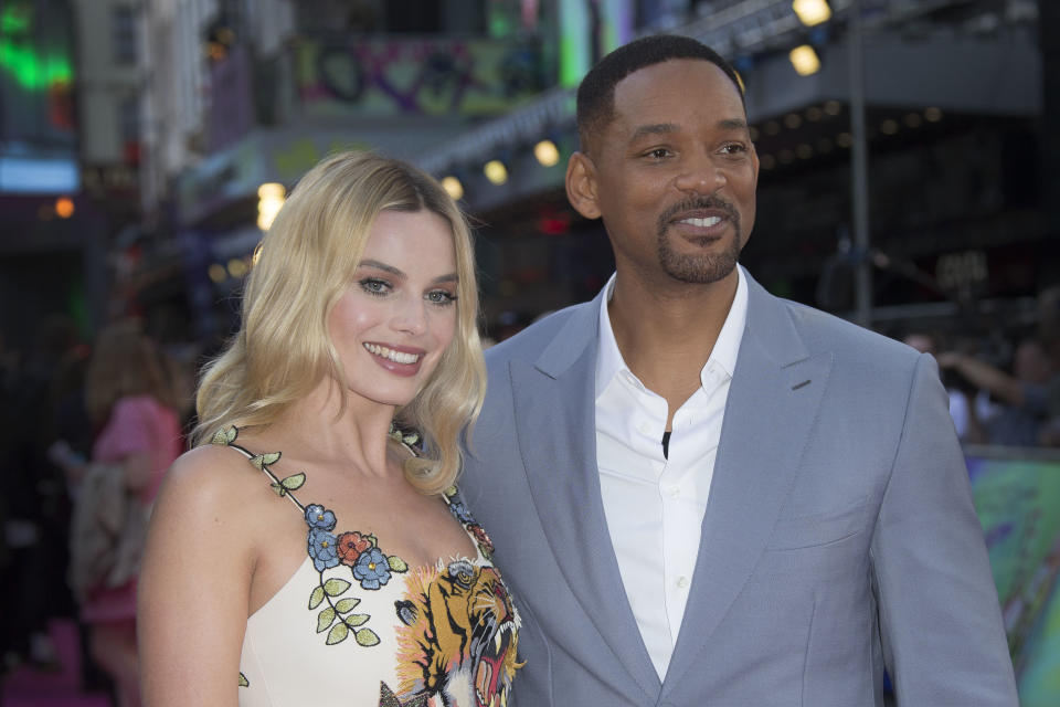 Actors Will Smith and Margot Robbie pose for photographers upon arrival at the European Premiere of Suicide Squad, at a central London cinema in Leicester Square, Wednesday, Aug 3, 2016. (AP Photo/Joel Ryan)
