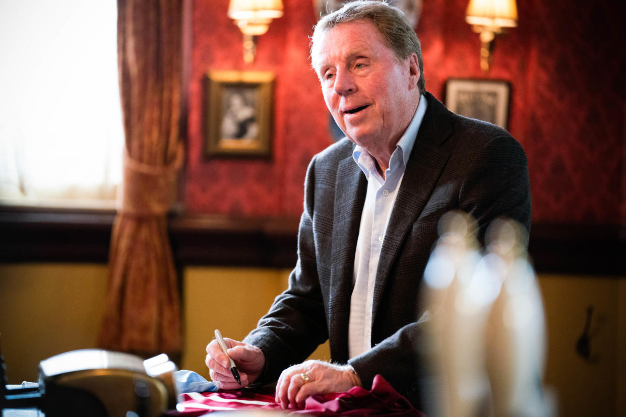 Harry Redknapp signs Mick Carter's shirt in the Queen Vic. (BBC)