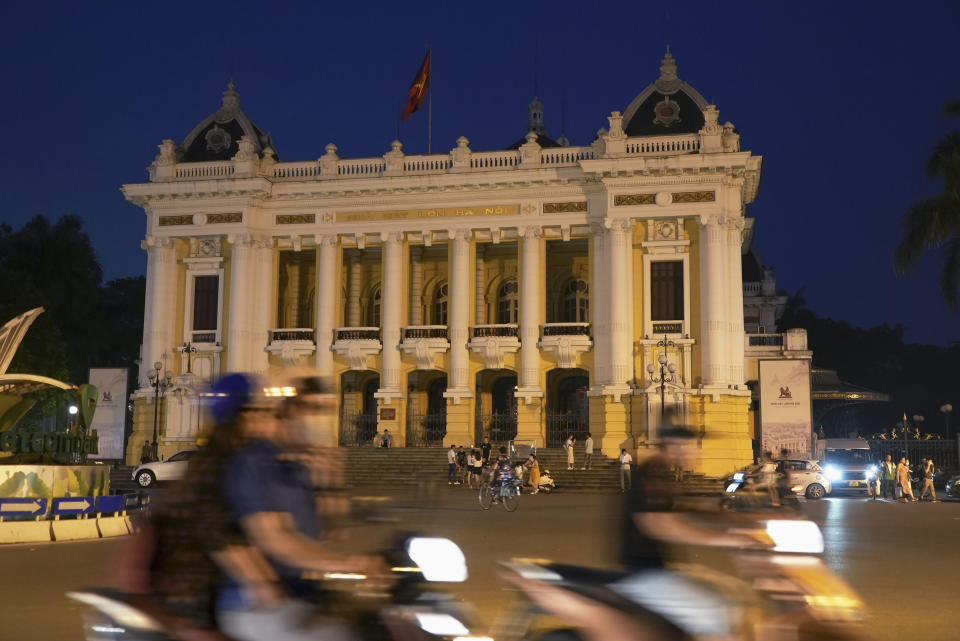 Exterior lighting is switched off at Hanoi Opera House in Hanoi, Vietnam, on June 8, 2023. Vietnam has released a long-anticipated energy plan meant to take the country through the next decade and help meet soaring demand while reducing carbon emissions. (AP Photo/Hau Dinh)