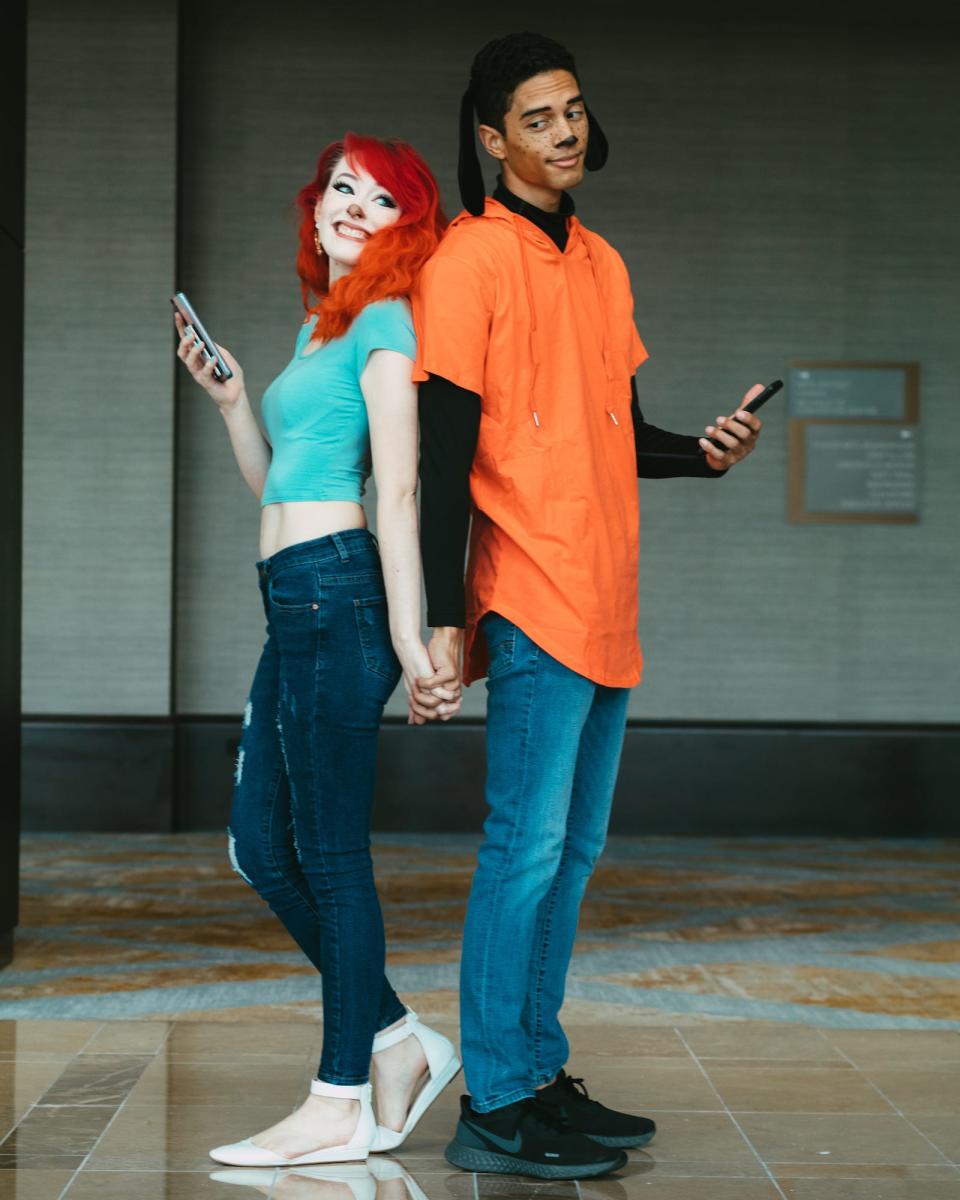 Disney fans Vae and Jamie dress as Max and Roxanne for Halloween.