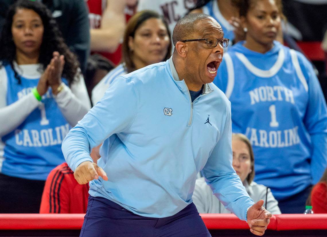 North Carolina coach Hubert Davis reacts to a foul against his team in the second half against N.C. State on Sunday, February 19, 2023 at PNC Arena in Raleigh, N.C.