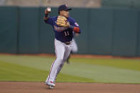 Minnesota Twins second baseman Jorge Polanco throws out Oakland Athletics' Luis Barrera at first base during the fourth inning of a baseball game in Oakland, Calif., Monday, May 16, 2022. (AP Photo/Jeff Chiu)