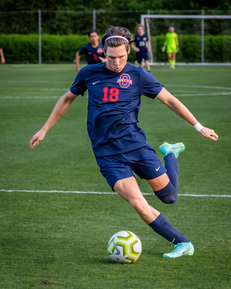 Oakland's Brayden Wilson kicks in the match's lone goal during Thursday's District 8-3A tournament championship vs. Siegel at Siegel Park.