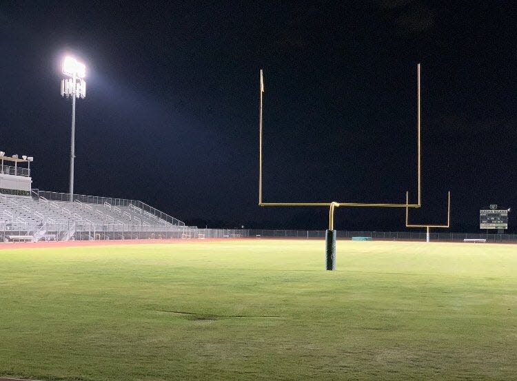 Basha High School's football field lights honor students.