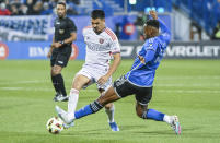 CF Montreal's Mason Toye, right, defends against Orlando City's Cesar Araujo during the first half of an MLS soccer match Saturday, April 20, 2024, in Montreal. (Graham Hughes/The Canadian Press via AP)