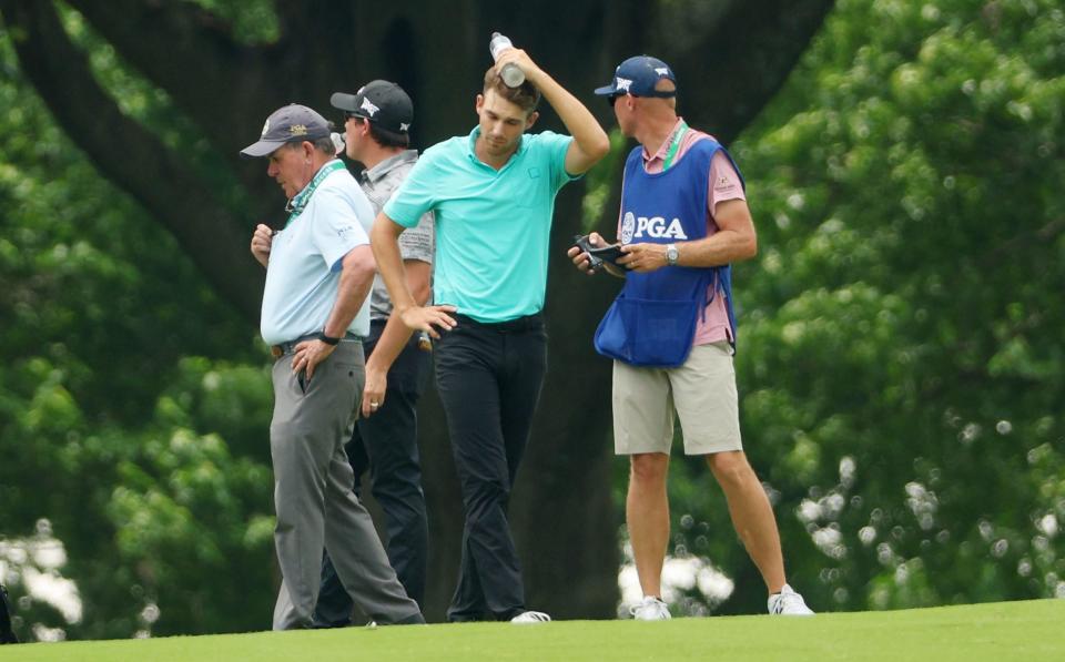 Feeling the pain Wise uses a cold bottle of water to ease the pain - GETTY IMAGES