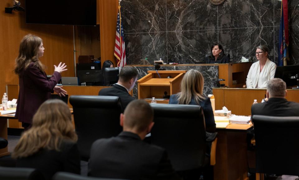 Shannon Smith speaks to her client Jennifer Crumbley who takes the stand in her own case in the Oakland County courtroom of Cheryl Matthews on Thursday, Feb. 1, 2024. Crumbley is being tried on four counts of involuntary manslaughter for the four students killed by her son, Ethan Crumbley, in a 2021 shooting at Oxford High School.