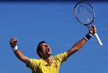 Serbia's Novak Djokovic reacts during his fourth round match against France's Gilles Simon at the Australian Open tennis tournament at Melbourne Park, Australia, January 24, 2016. REUTERS/Jason O'Brien Action Images via Reuters