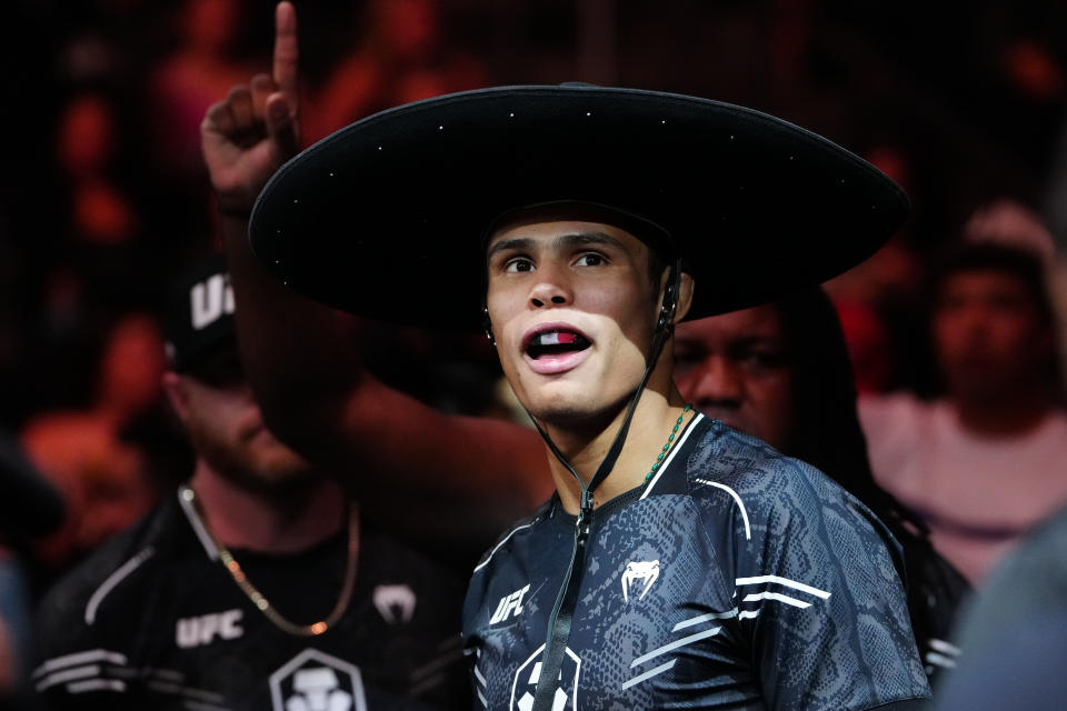 Sep 16, 2023; Las Vegas, Nevada, USA; Daniel Zellhuber (red gloves) prepares to fight Christos Giagos (not pictured) during UFC Fight Night at T-Mobile Arena. Mandatory Credit: Stephen R. Sylvanie-USA TODAY Sports