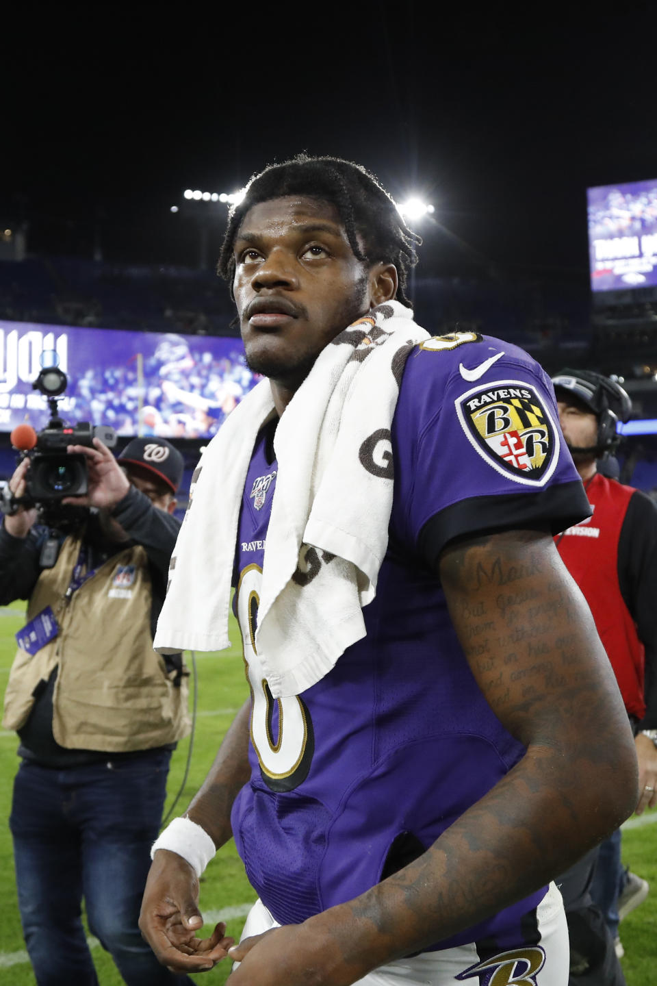 Baltimore Ravens quarterback Lamar Jackson leaves the field after an NFL divisional playoff football game against the Tennessee Titans, Saturday, Jan. 11, 2020, in Baltimore. The Titans won 28-12. (AP Photo/Julio Cortez)