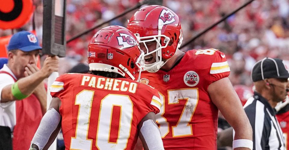 Kansas City Chiefs running back Isiah Pacheco celebrates his touchdown with tight end Travis Kelce during an Oct. 22 game against the Los Angeles Chargers.