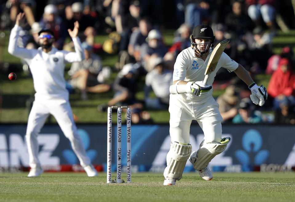 New Zealand's Tom Latham sets off for a run while batting during play on day one of the second cricket test between New Zealand and India at Hagley Oval in Christchurch, New Zealand, Saturday, Feb. 29, 2020. (AP Photo/Mark Baker)
